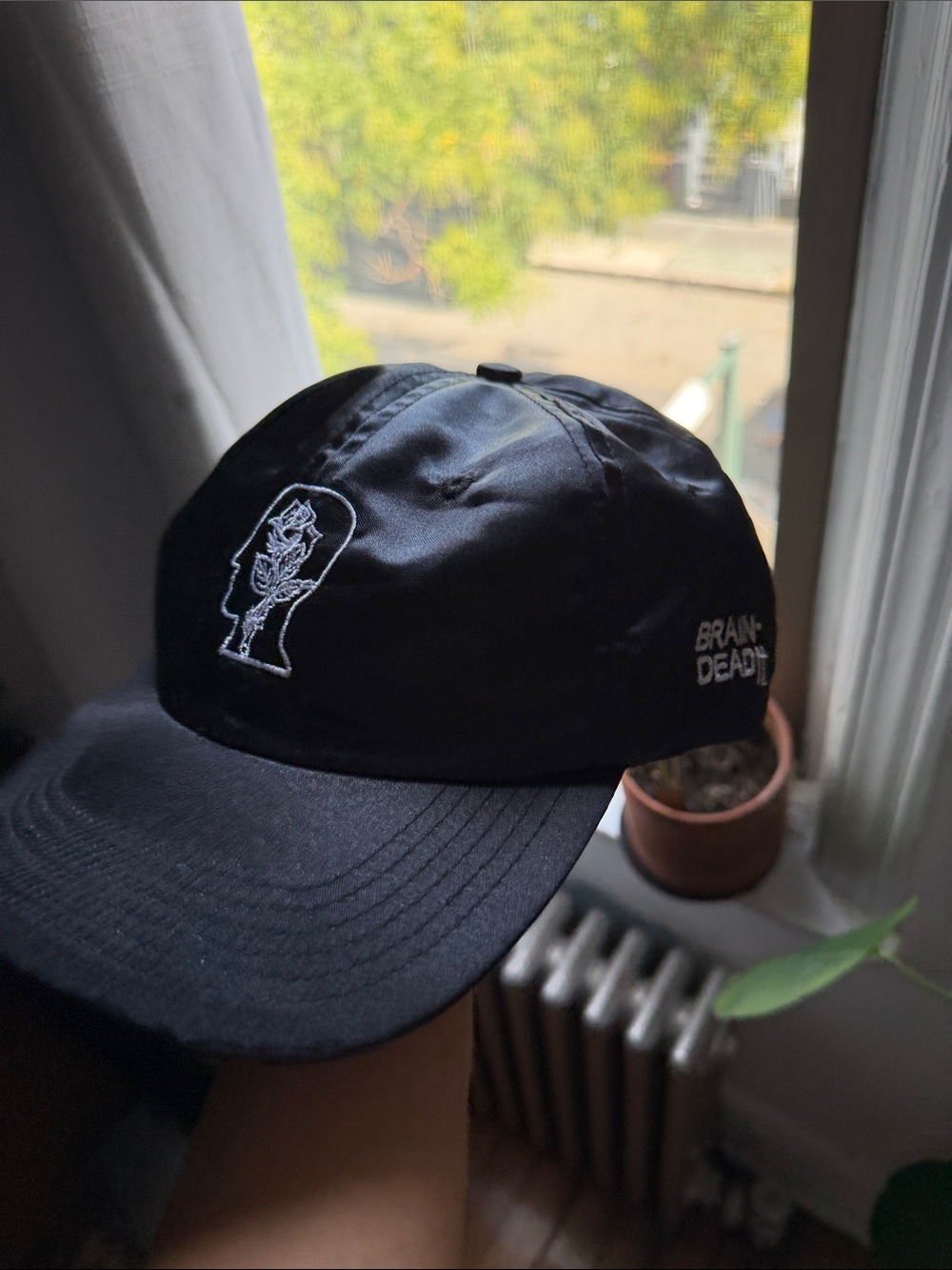 Brain Dead Black Cap with White Embroidered Head Motif